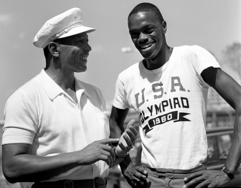 Ralph Boston, right, with Jesse Owens after he surpassed the great man's world long jump record.