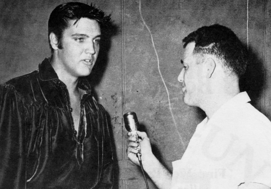 Jack Cristil interviews Elvis Presley. "Worst interview I ever did," Cristil said years later.