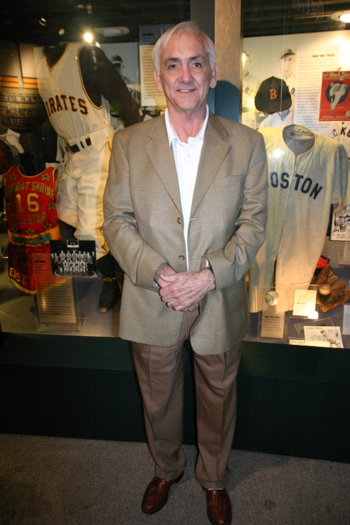 Doug Cunningham, in front of the Hall of Fame's Wall of Memories.