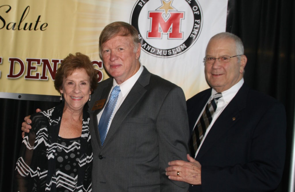 Wallace McMillan (right) and his wife, Sarah, with Mike Dennis at his induction into the Mississippi Sports Hall of Fame. (Photo courtesy of Sara Running)